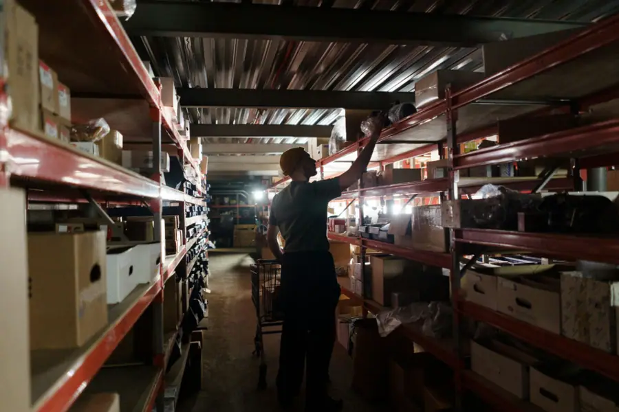 3PL provider arranging stock in the warehouse